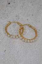 Gouden hoops met parels