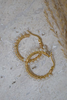 Gouden hoops met parels